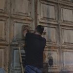 A Muslim keyholder locks the Holy Sepulchre door (Seetheholyland.net)