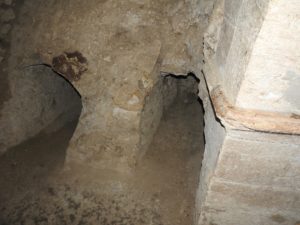 Another view of two kokhim tombs adjacent to main ritual cave (© Gregory Jenks)