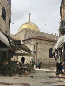 Golden dome of Church of St John the Baptist peeps over Muristan roofs (Seetheholyland.net)