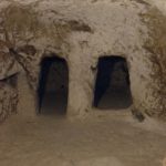 Kokhim tombs inside the venerated cave (© Gregory Jenks)