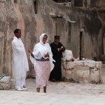 Members of Ethiopian Orthodox community at lunch on roof of Church of the Holy Sepulchre (Seetheholyland.net)