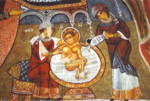 Salome (right) and the midwife (left) bathing the infant Jesus in a 12th-century fresco (Open Air Museum, Goreme, Cappadocia)