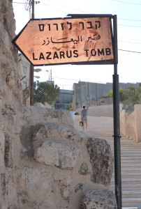 Tomb of Lazarus with security wall in background (Seetheholyland.net)