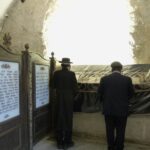 Two Jewish men praying before the Tomb of David (Seetheholyland.net)