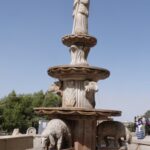 Sheep and shepherd on the fountain at Shepherds' Field (Seetheholyland.net)