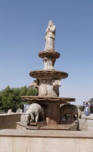 Sheep and shepherd on the fountain at Shepherds' Field (Seetheholyland.net)